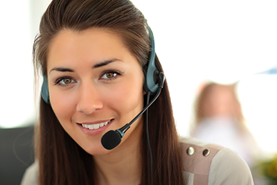 Female-customer-support-operator-with-headset-and-smiling